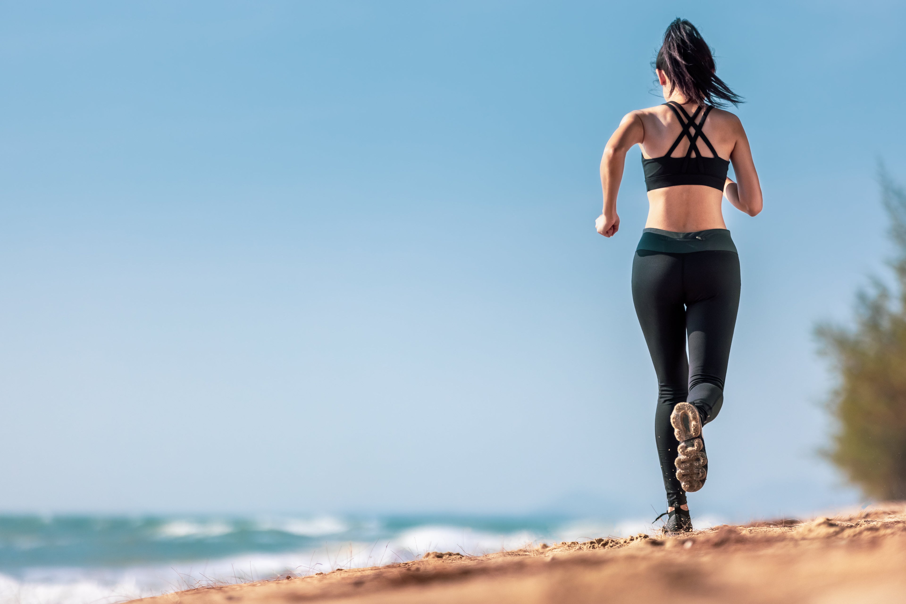 lady running on beach